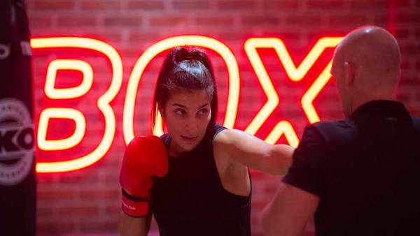 female Fitness First member in X-FIT BOX training program