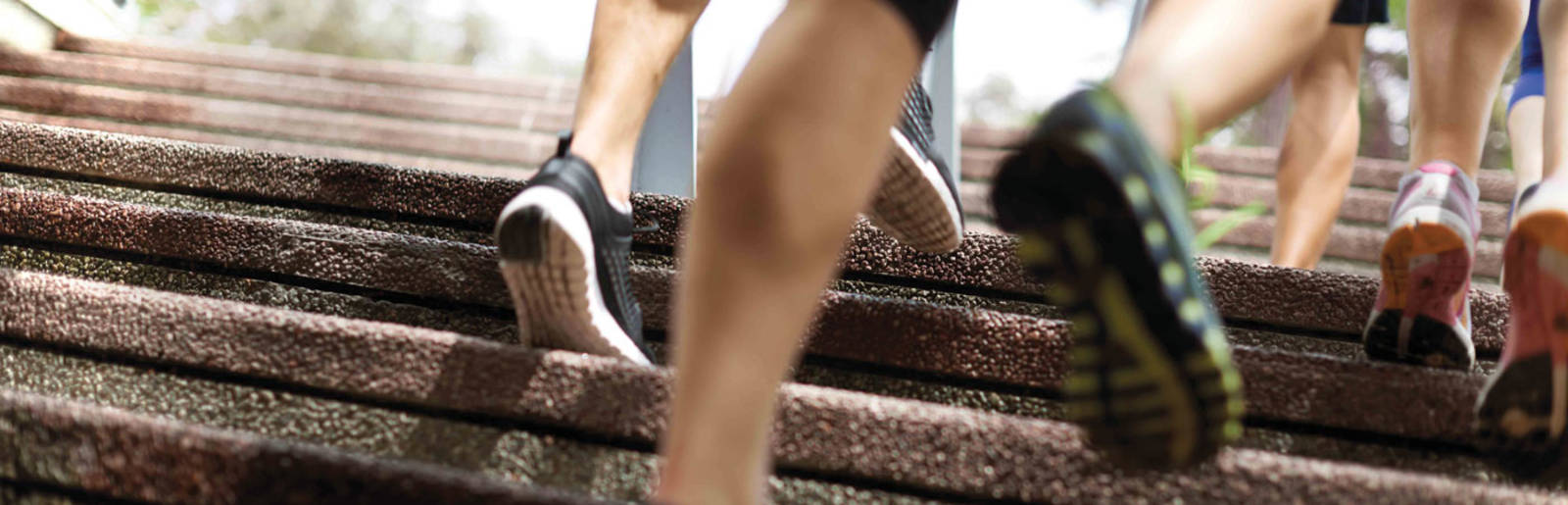 athletes running upstairs